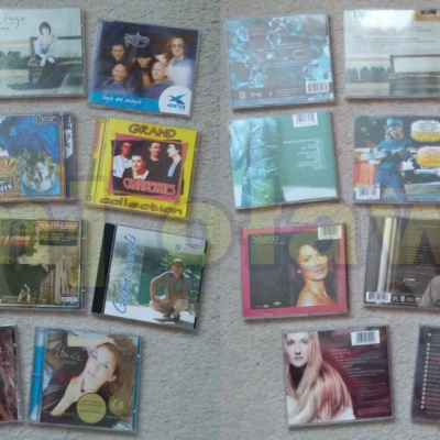 muzyczna kolekcja płyt CD różni wykonawcy różny rodzaj muzyki Madonna Eminem Enya Beastie Boys